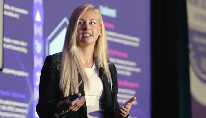 Woman Speaking at a Summit