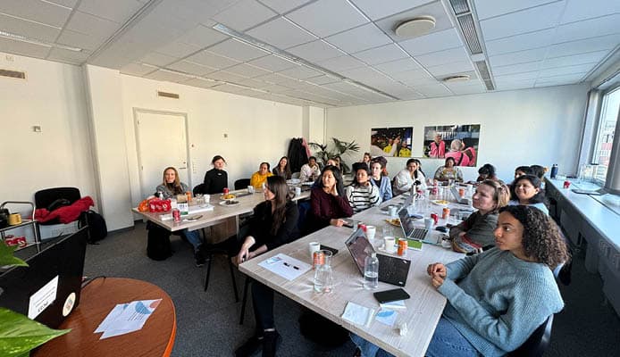 REDI: People Sitting at Desks