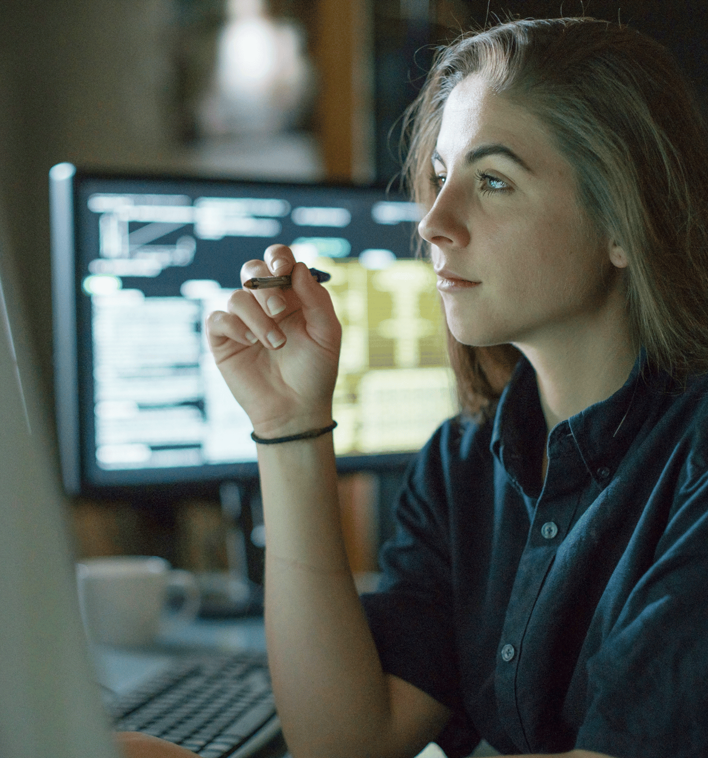 Thinking Woman Holding a Pen and Reading