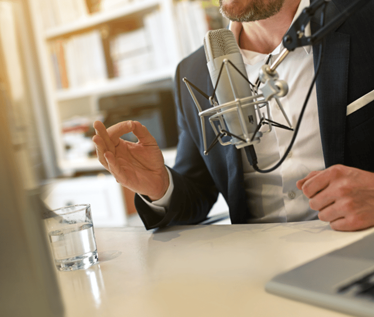 Man talking into microphone
