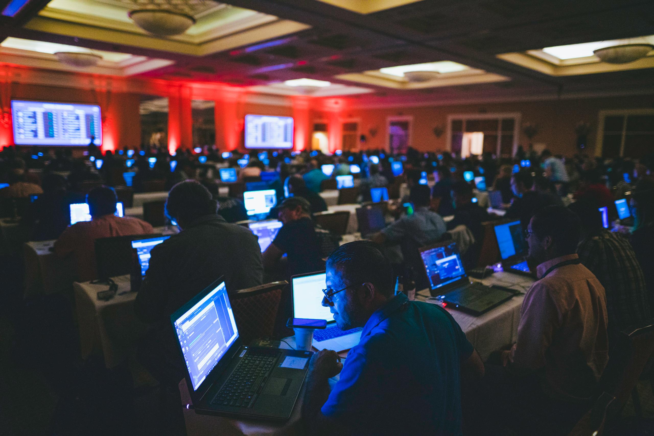 Dark NetWars Room Full of People: 1168x860