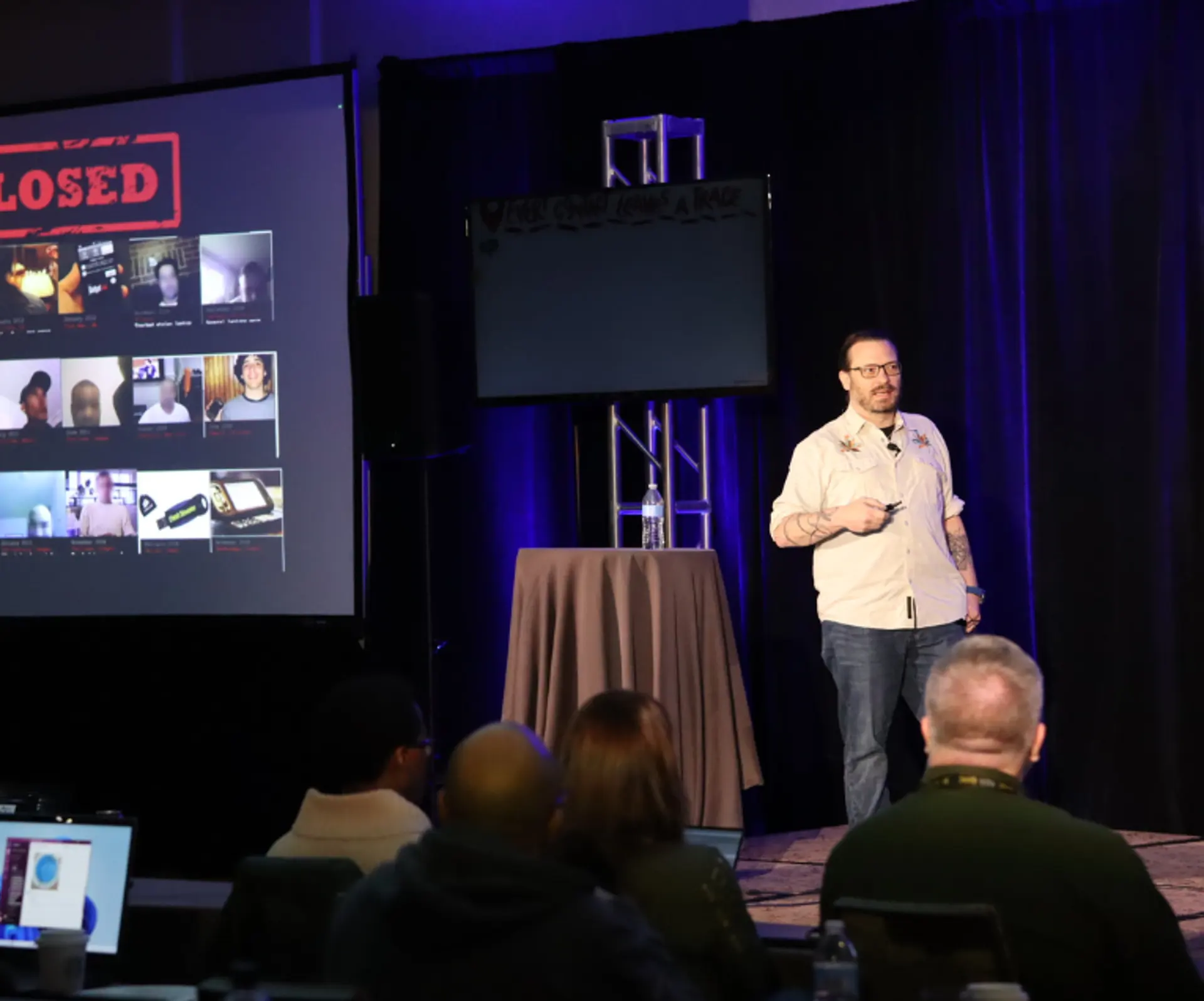 Man on a Stage Talking During a Summit