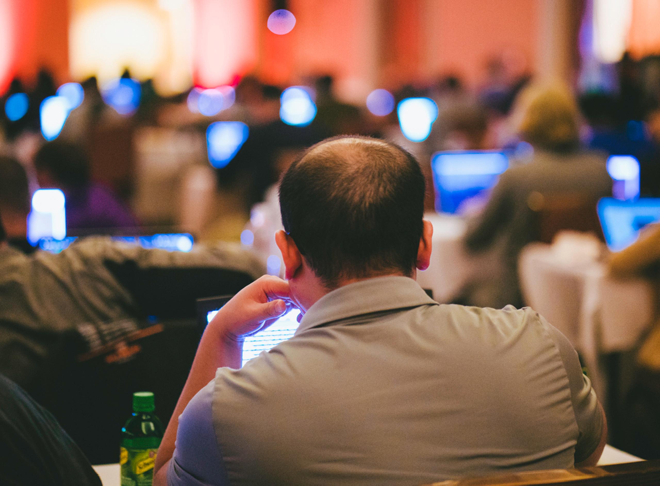 Back of a Man's Head in a NetWars Room