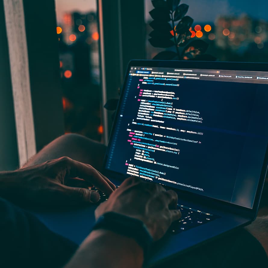 Close Up of Hands Typing Code on a Computer