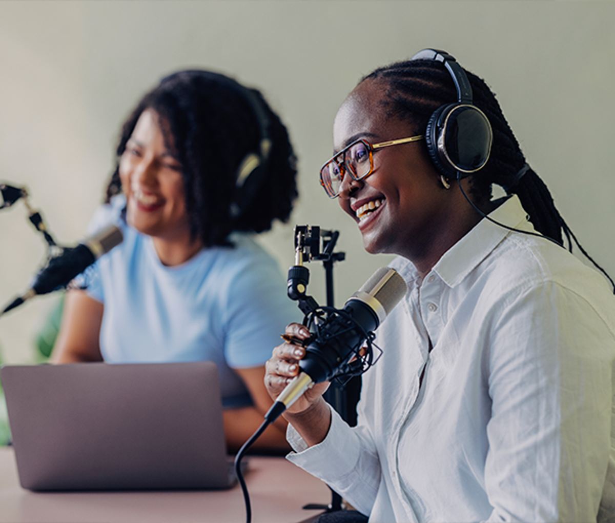 Two people presenting a webcast