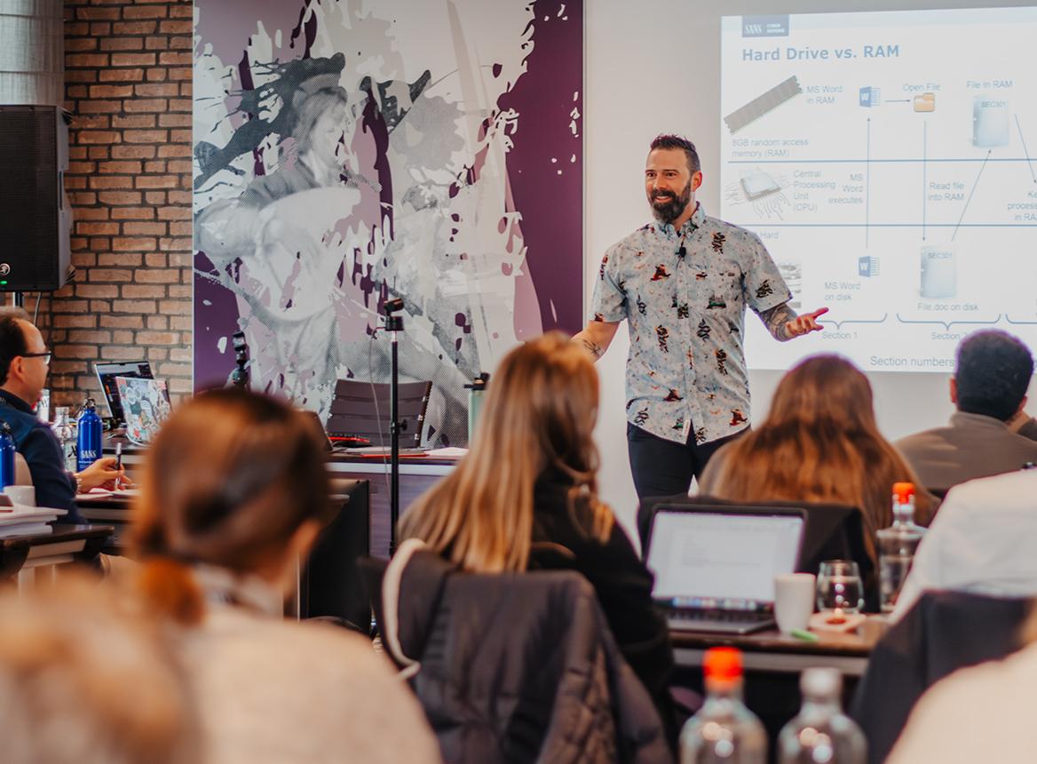 Rich Greene: Teacher Smiling While Explaining a Concept