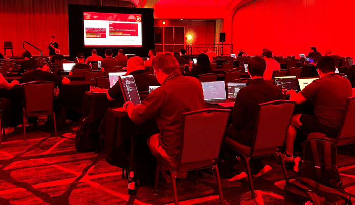 SANS Students Participating in Netwars with Red Overlay