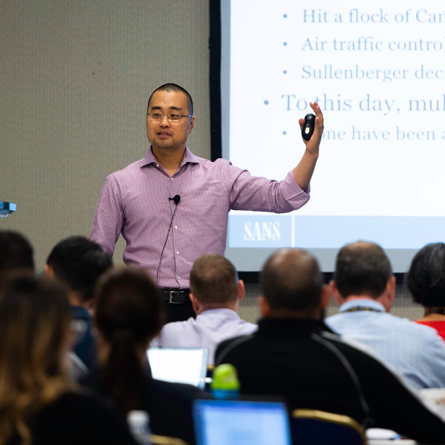 Frank Kim: Teacher Explaining a Concept in Class