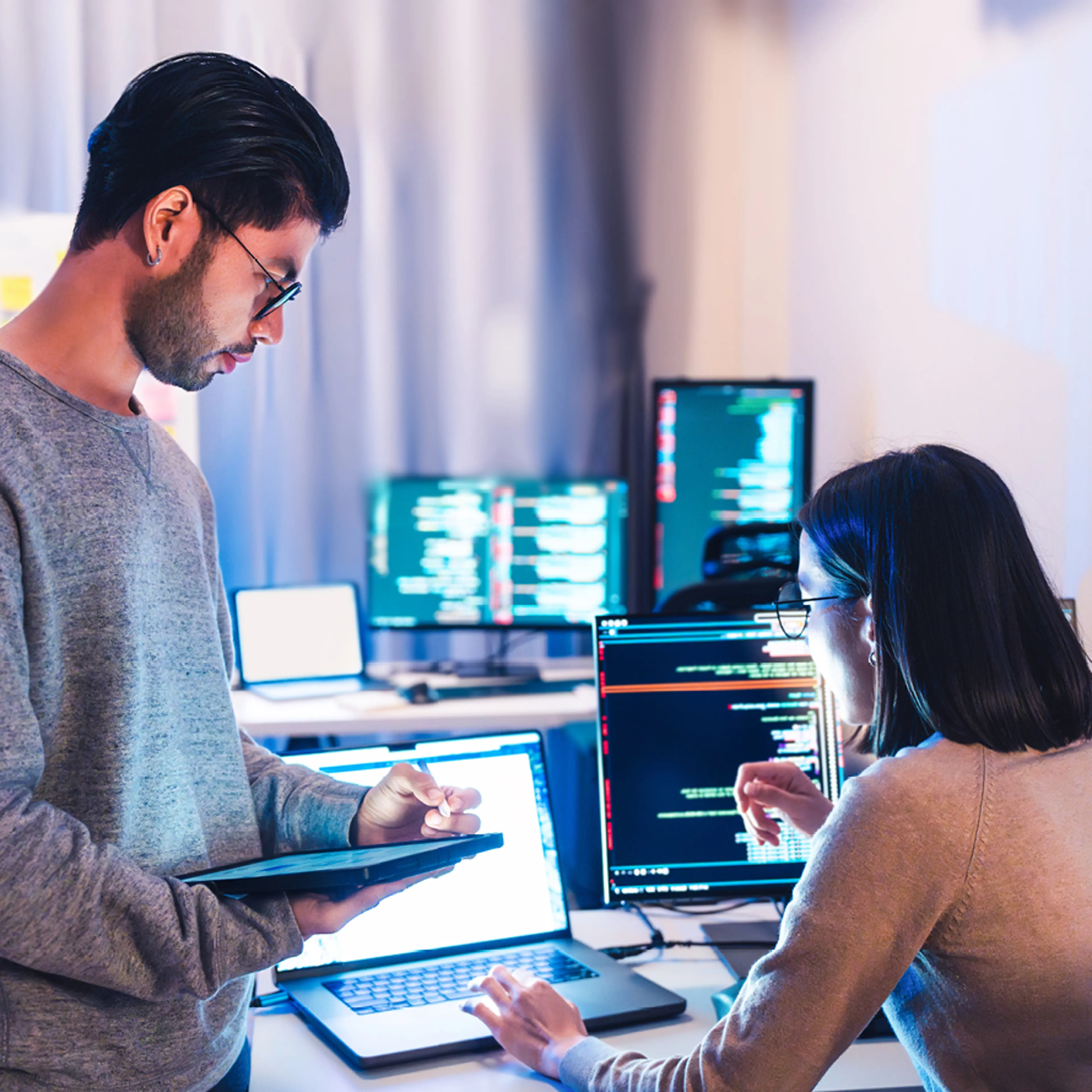 Two People Working in Office