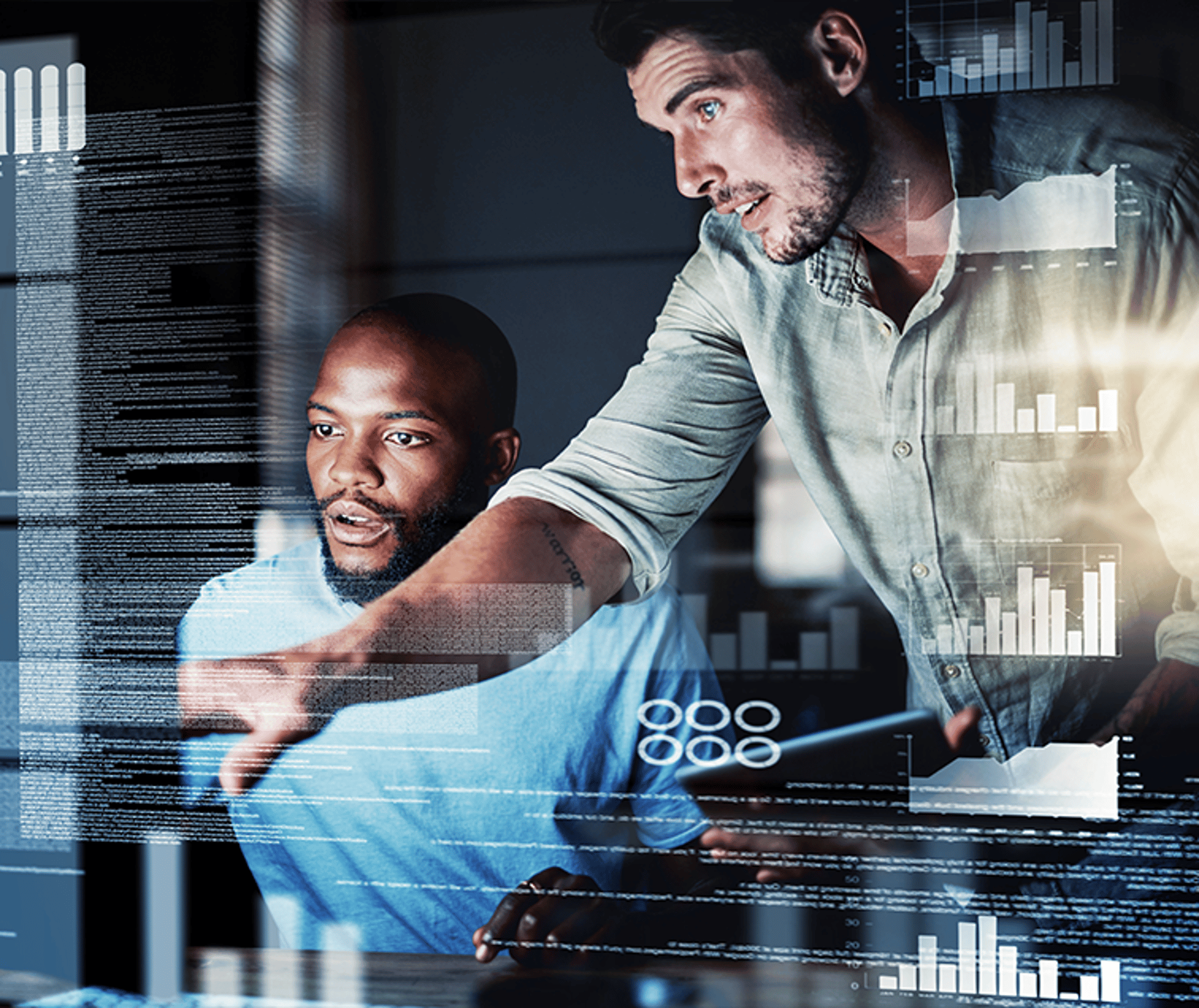 Two Men Looking at Monitor With Unreadable Text Overlaid