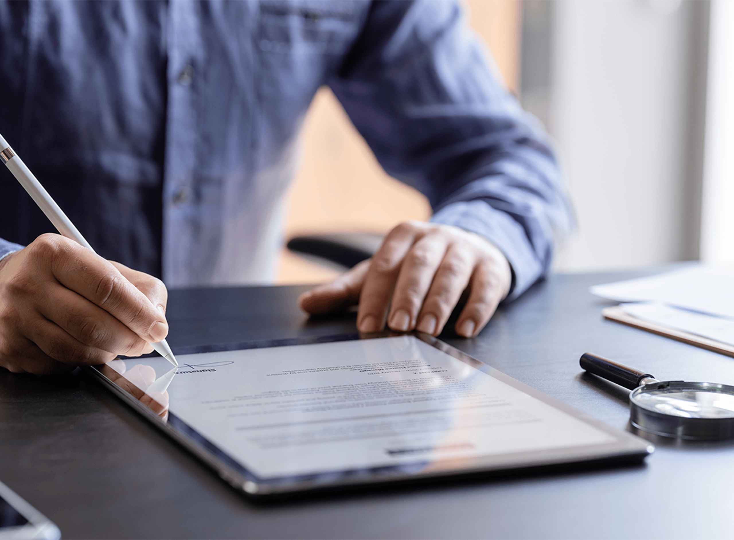 Close Up of Person Writing on a Tablet