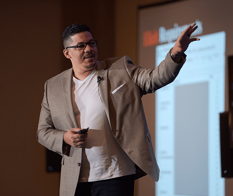 Man on Stage Speaking