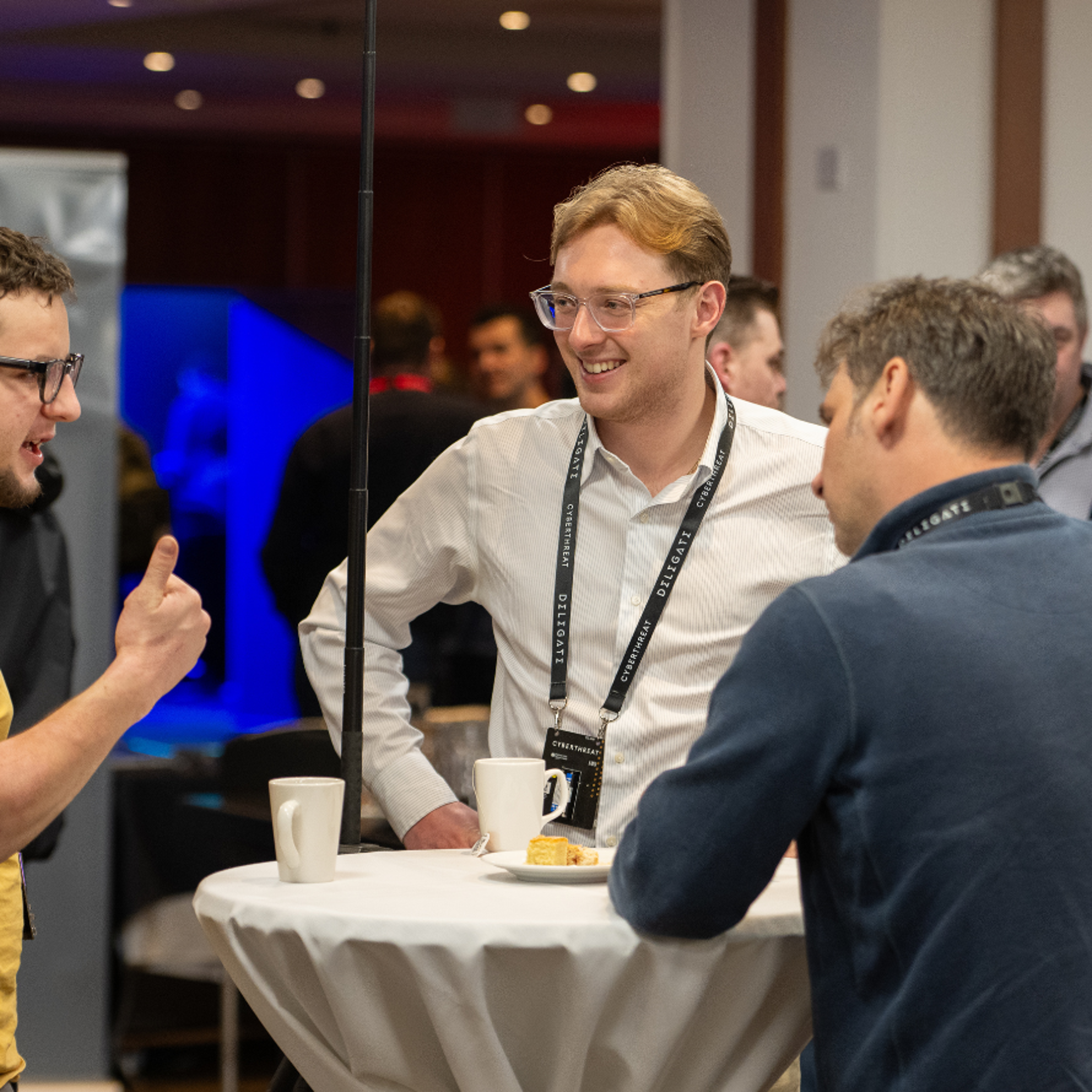 Students Talking Around a Table With Coffee