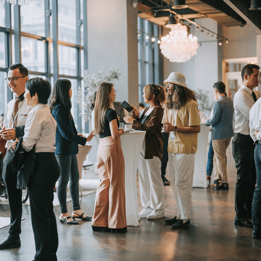 People Networking in Large Fancy Venue