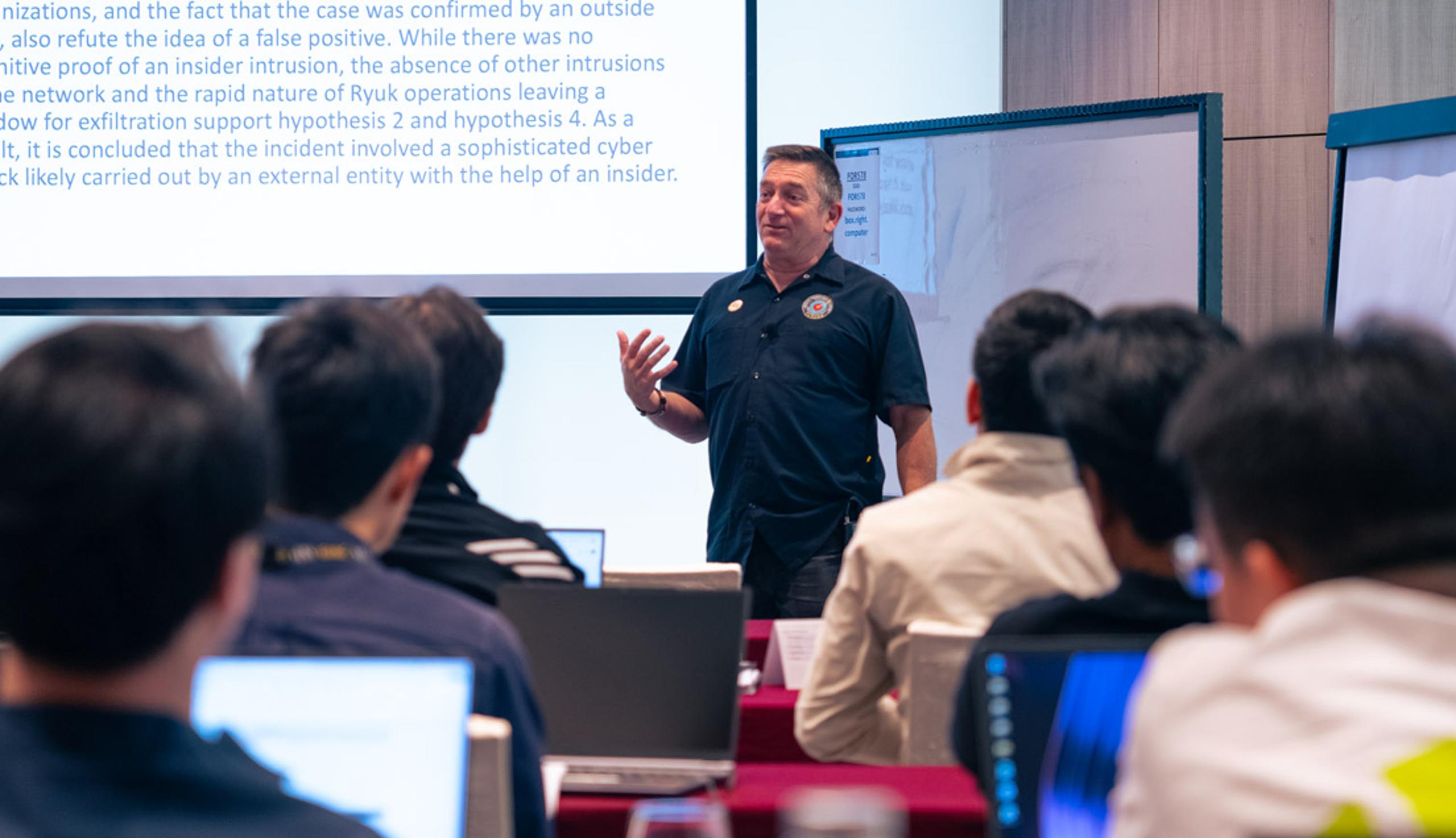 Male Instructor Teaching in a Classroom
