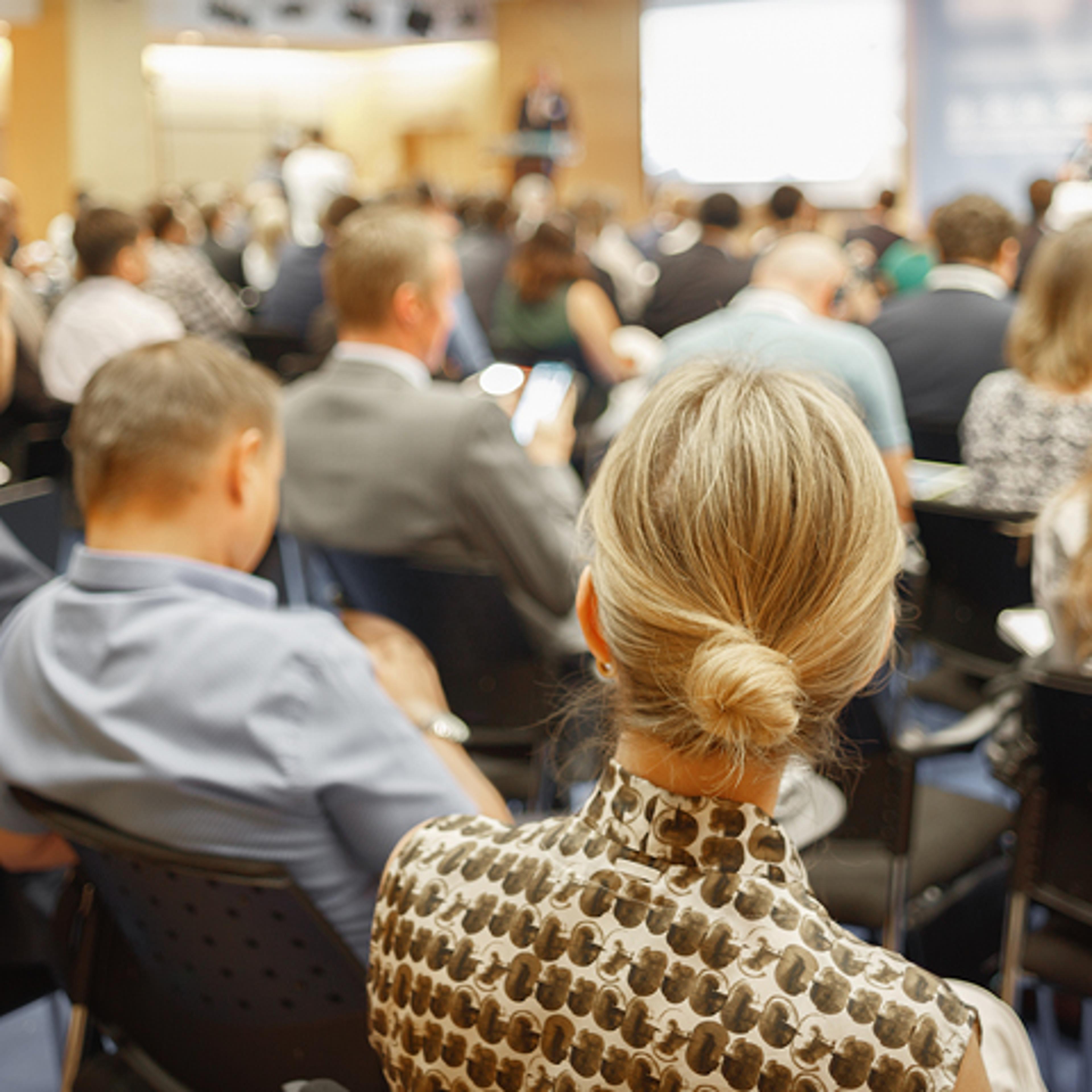 Back of People's Heads While at a Presentation