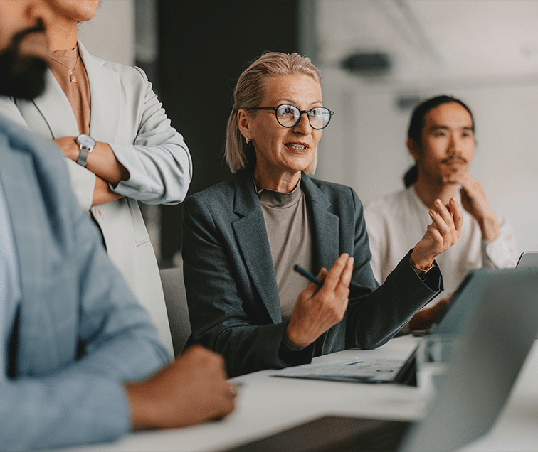 Woman in Meeting Talking and Gesturing