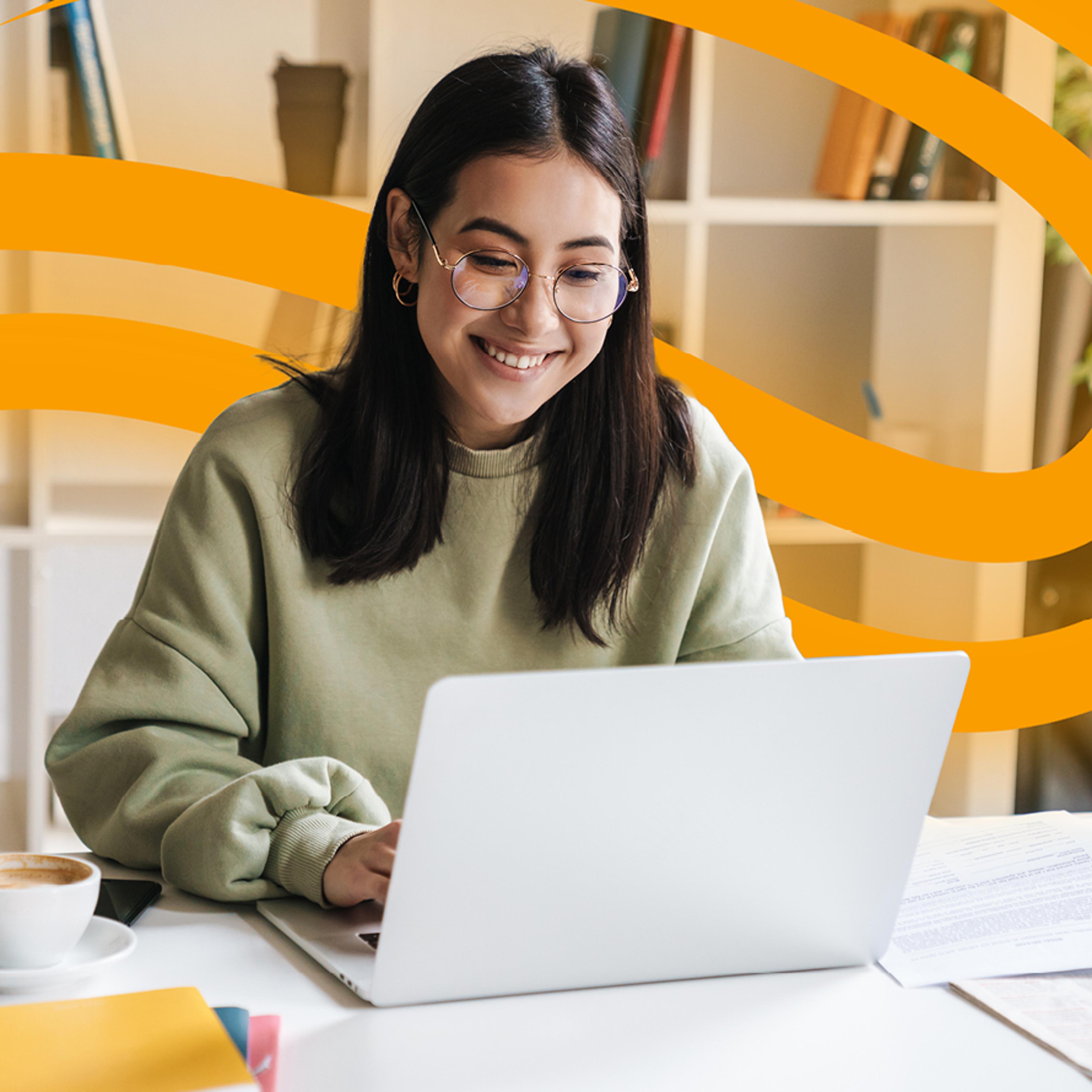 Woman Typing on Laptop