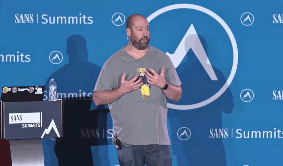 OSINT 2026: Man Speaking at a Summit