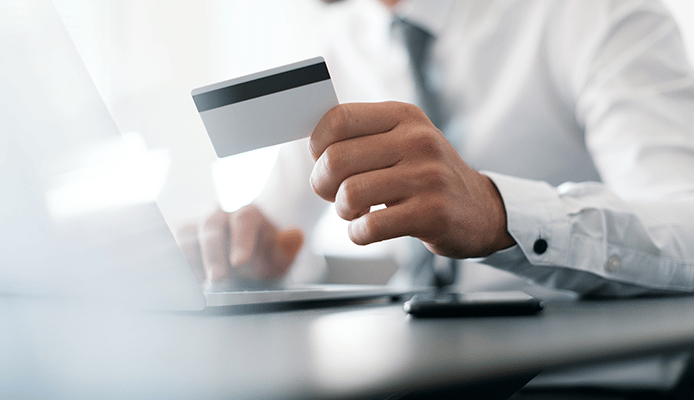 Person Holding a Card You Can Swipe