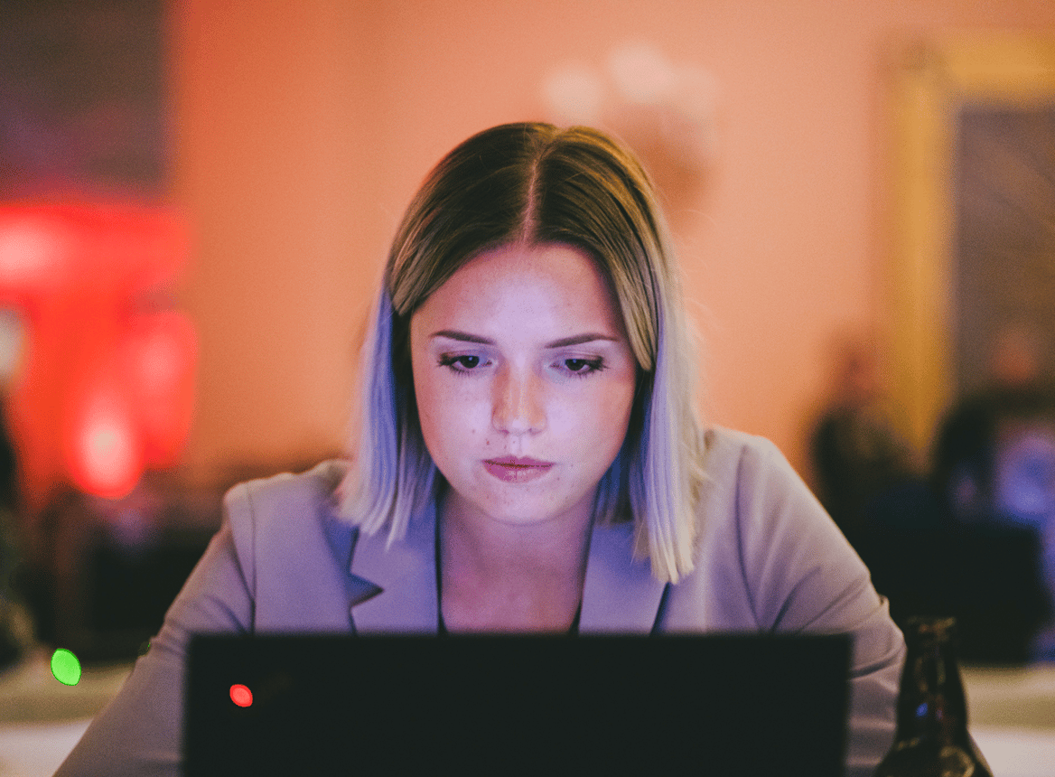 Woman NetWars Tournament Student Looking at Screen