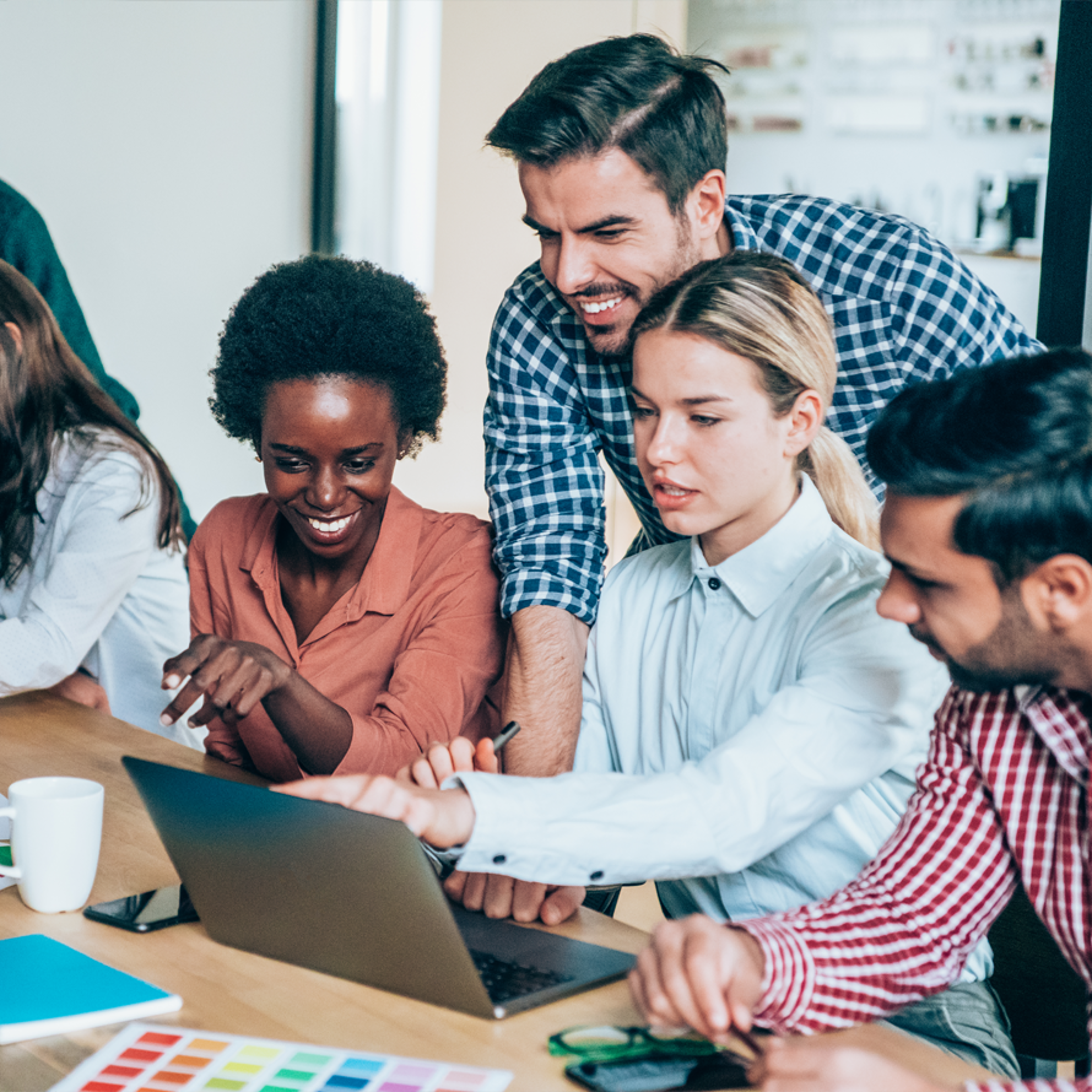 Hero: A Group of People Working on Laptop: 890x890
