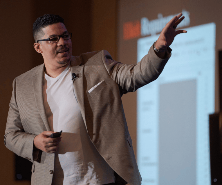 Man on Stage Speaking