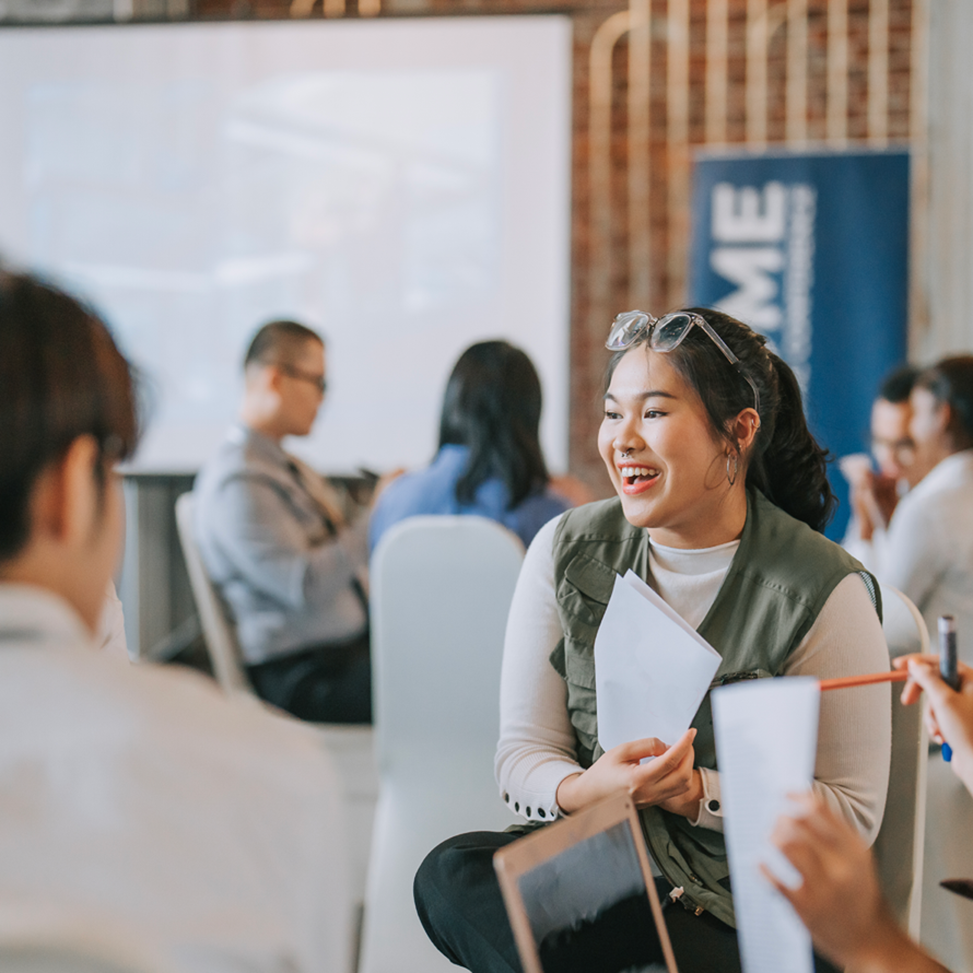 Woman Smiling in an Event Room