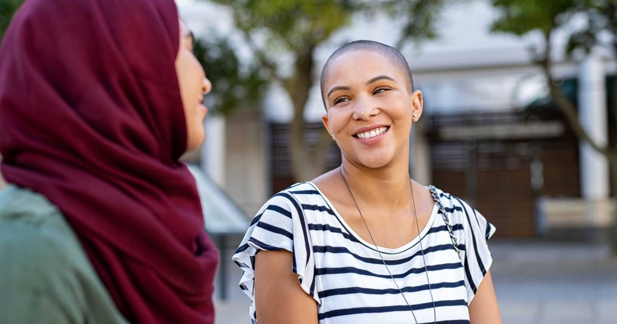 Women discuss the difference between German and Austrian German.