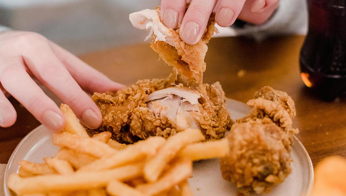 Fried chicken is a quintessential soul food dish that owes its roots to African cooking techniques.