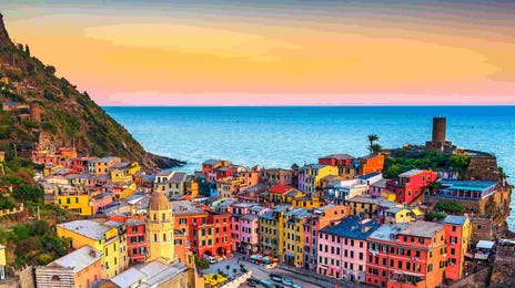 Scenic view of Vernazza, Italy at sunset—highlighting the immersive cultural backdrop that makes learning Italian online with Berlitz a rich and engaging experience.