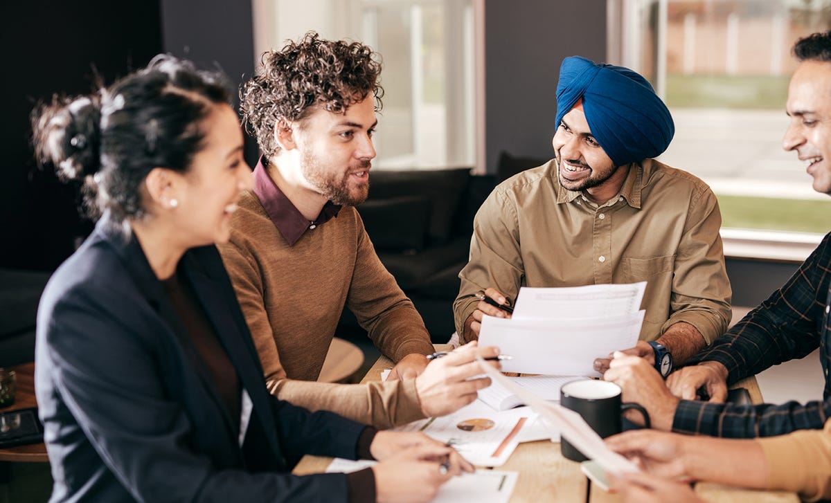 Diverse group of students collaborating during an online Portuguese language class