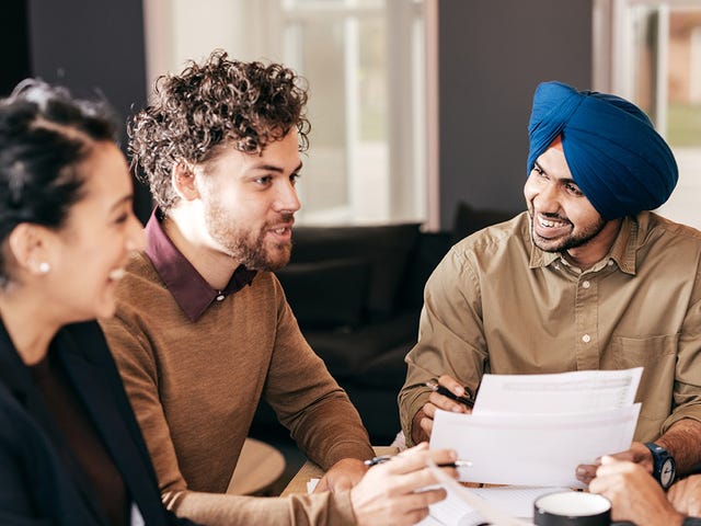 Diverse group of students collaborating during an online Portuguese language class