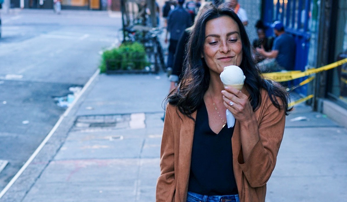 Woman enjoying ice cream.
