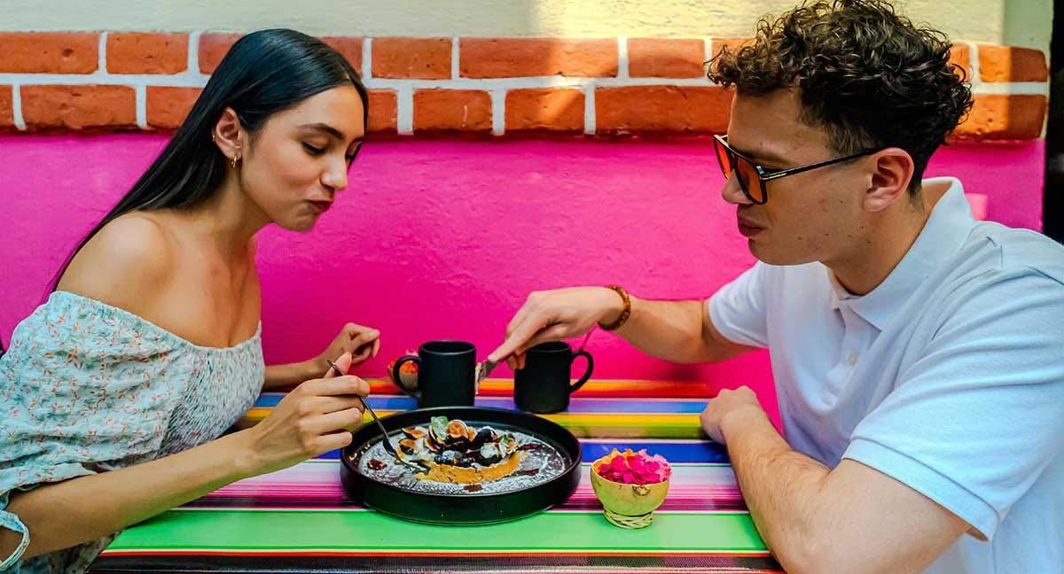 Couple enjoying Columbian food.