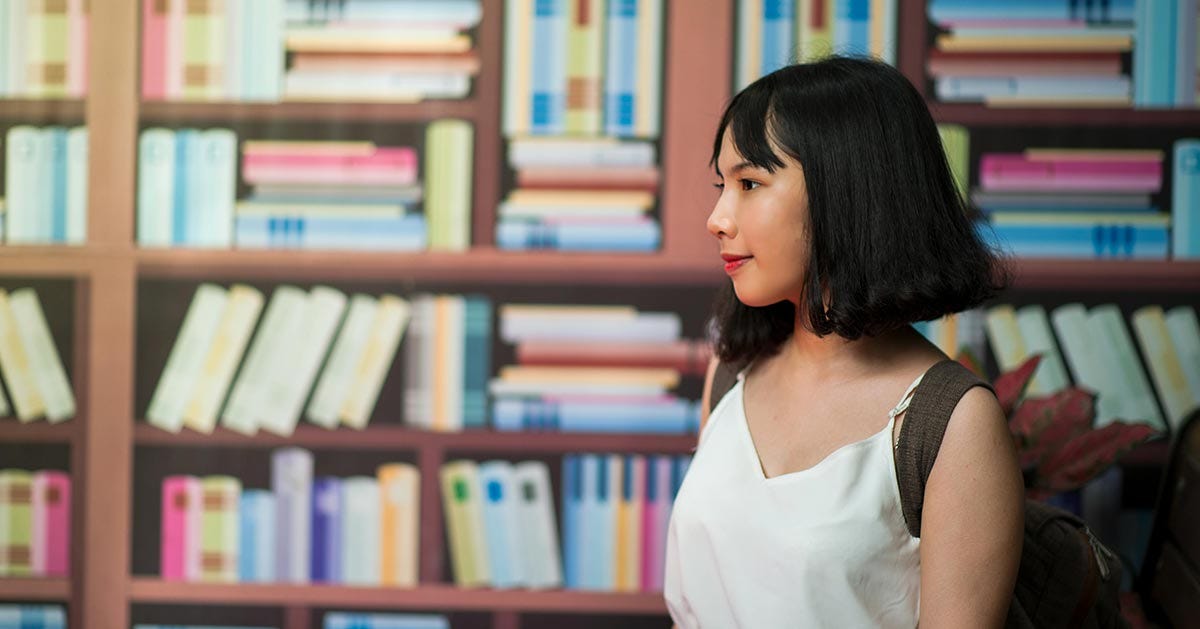 Woman visiting the local library.