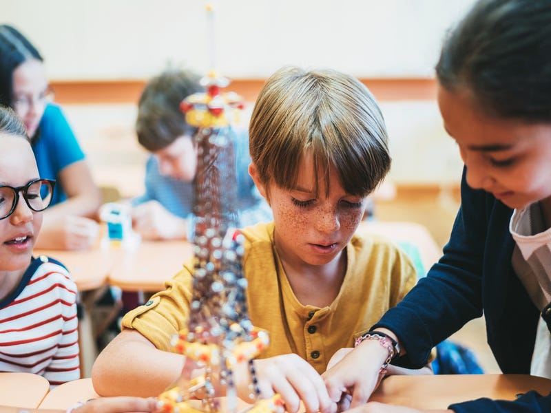 Children learning in language programs for schools