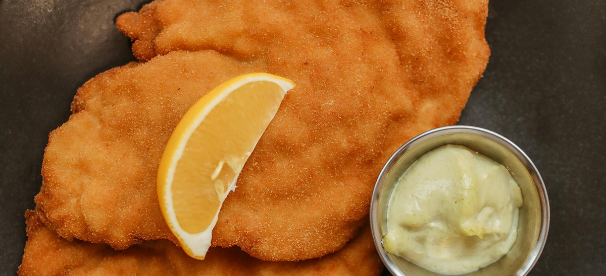 The famous Wiener Schnitzel is a thin cutlet of veal, breaded and fried to a golden crisp.