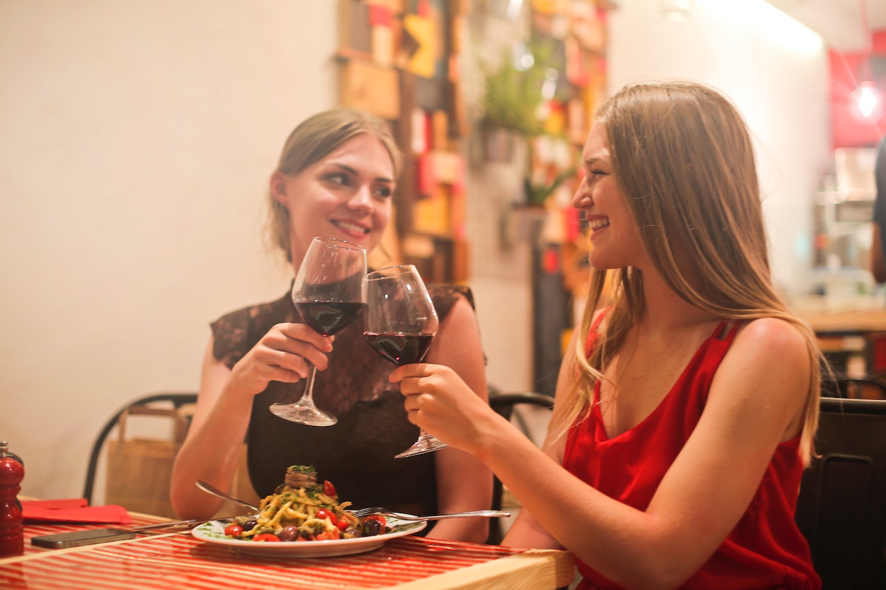 French pick up lines that work as these two women are on a dinner date.
