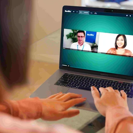 Student attending a Berlitz virtual language class from home, showcasing the convenience of flexible online courses with live instructors.