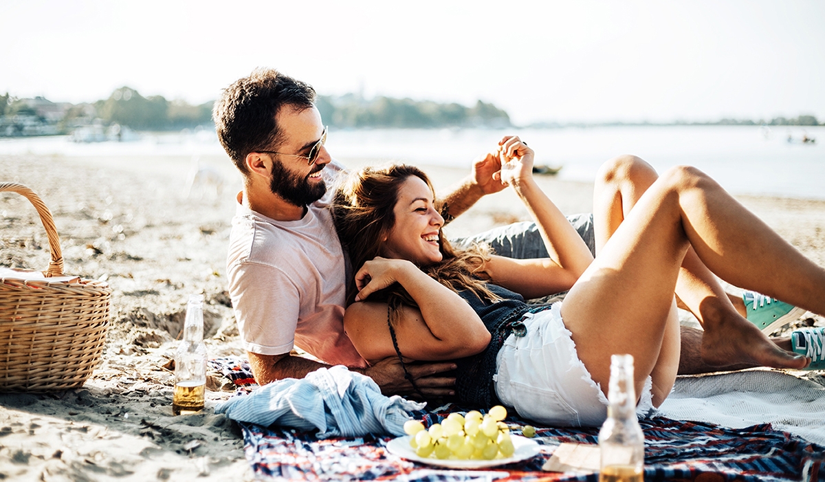 Couple having a romantic picnic in France.