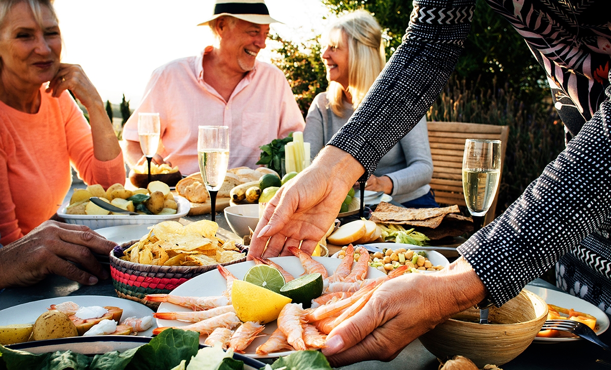 Friends and family get together to feast during New Year traditions in Italy.