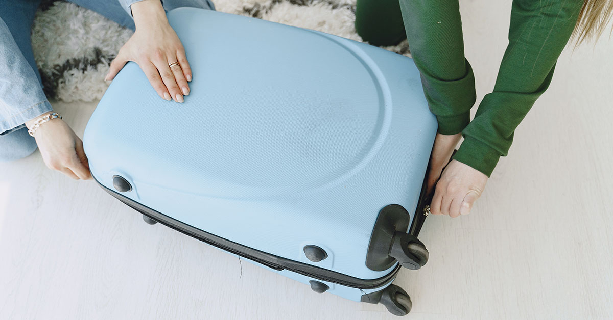 Unpacking your suitcase at your holiday destination.