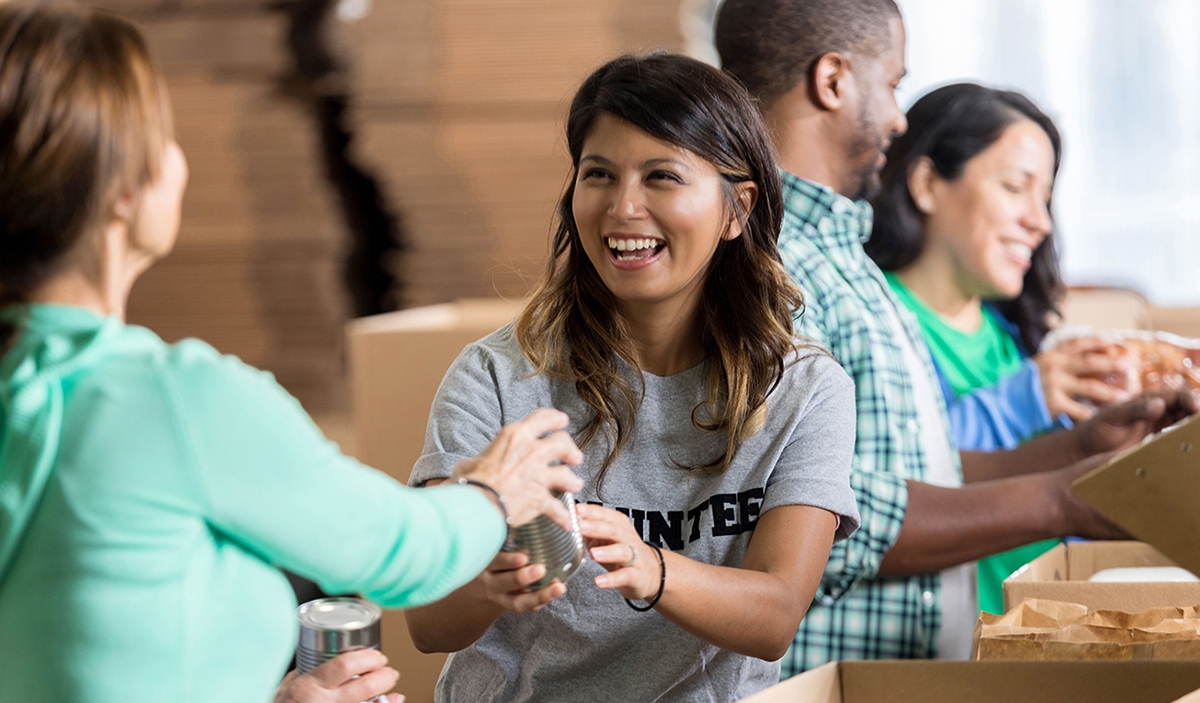 Woman increases her positive social impact by working for a non profit organization.