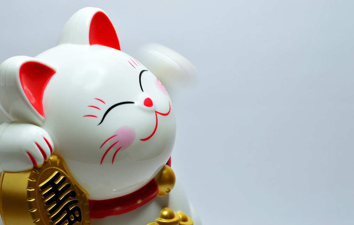The maneki-neko or 招き猫, is a common Japanese figurine which is often believed to bring good luck to the owner.