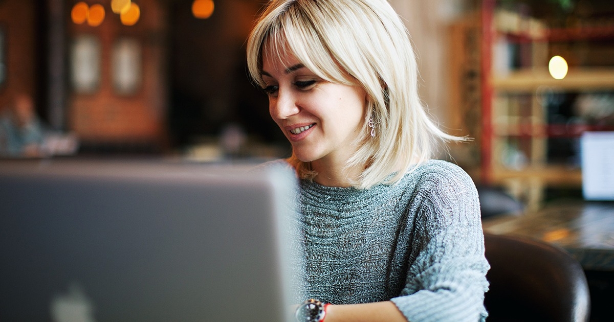 French woman chatting online with her French Canadian friend.