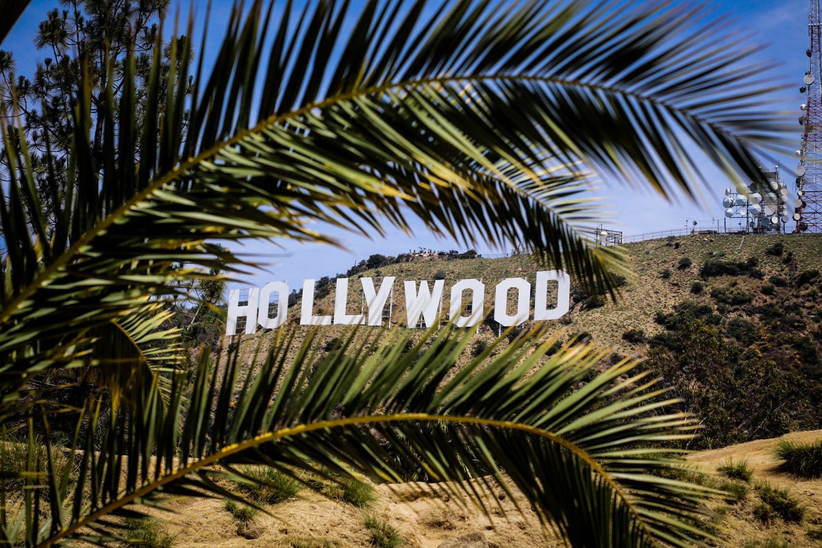 Travel to the Hollywood sign in California and learn Californian slang.