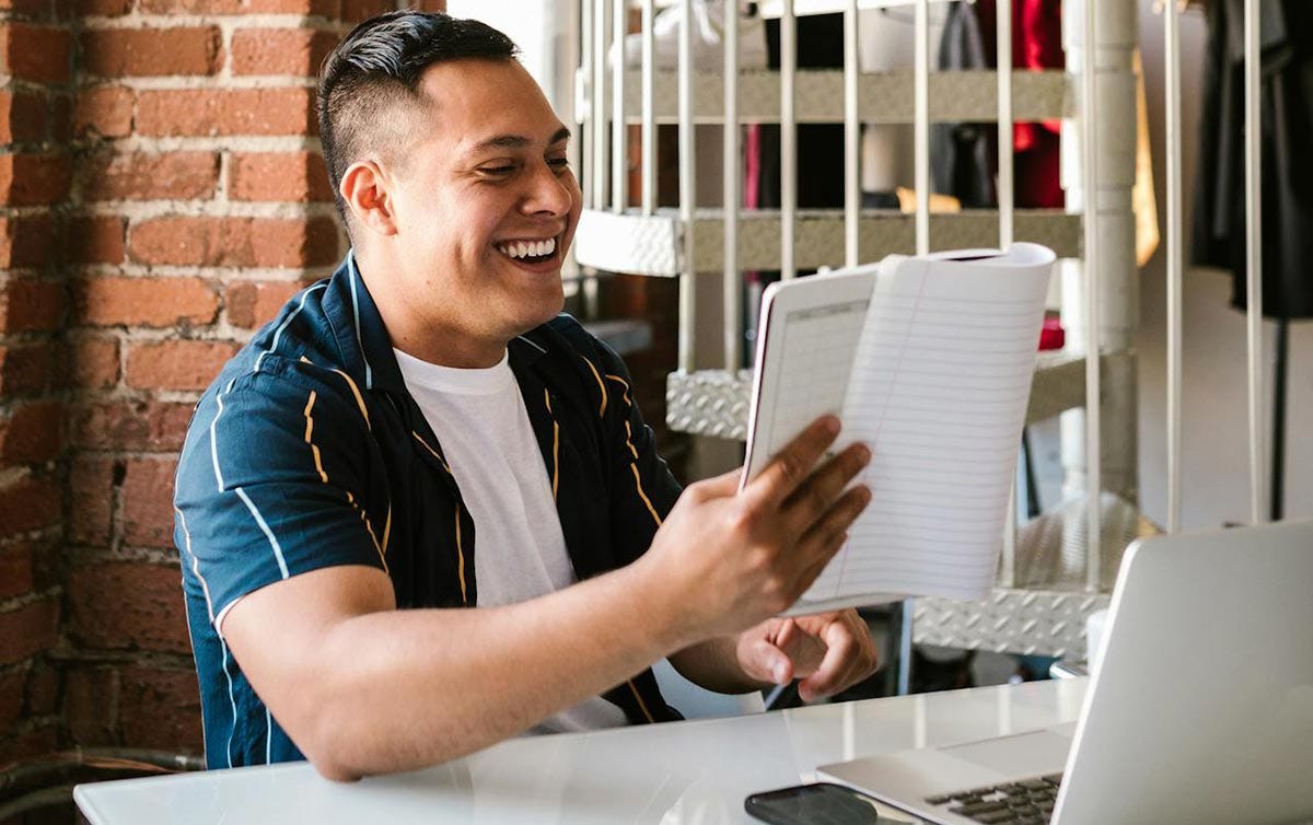 Man reading general rules for identifying masculine nouns.