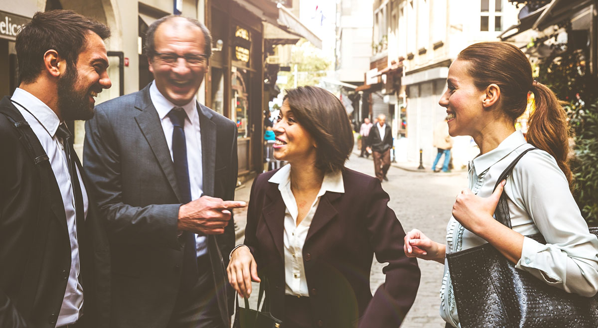 Collegues introduce themselves before a business meeting in Paris.