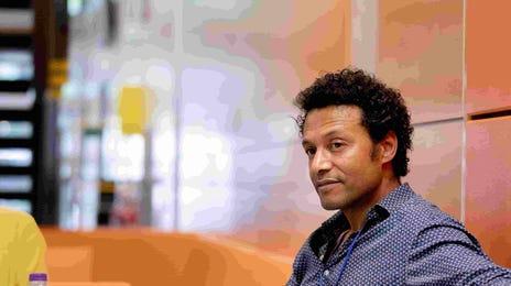 Group discussion in a modern, informal setting.